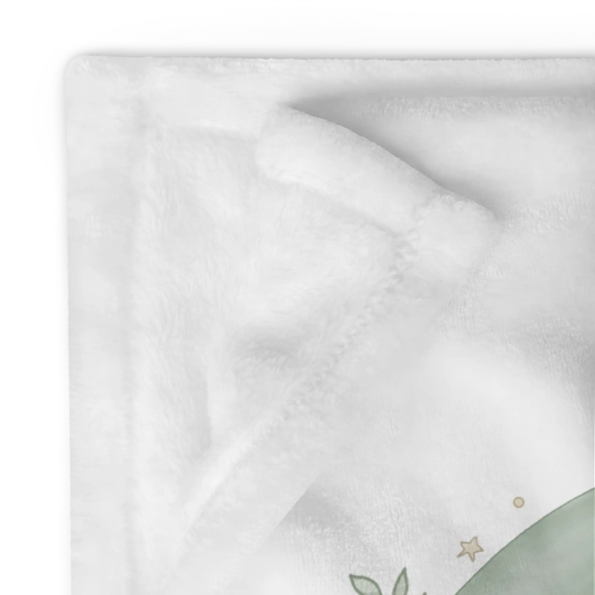 Dettaglio macro dell'angolo della coperta che evidenzia la consistenza vellutata e le cuciture precise.